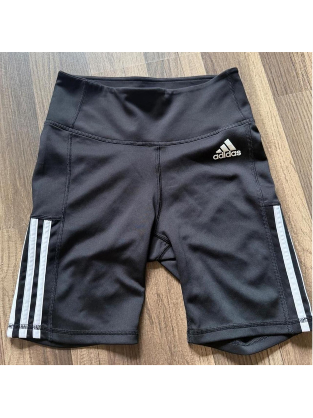 Adidas Techfit black compression biker shorts with classic white 3-stripe detail